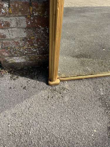 A Spectacular large Antique English 19th C shaped top gilt Mirror.