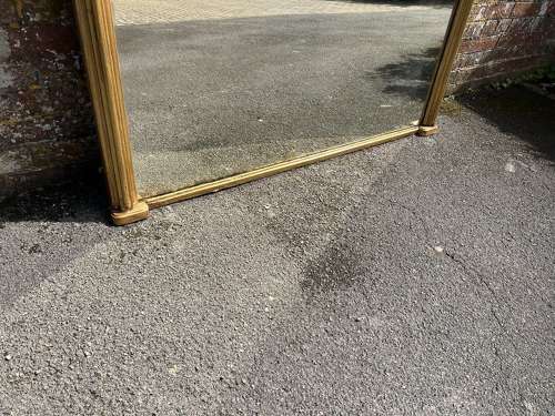 A Spectacular large Antique English 19th C shaped top gilt Mirror.