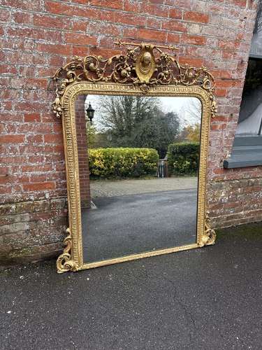 An Exceptional unusual large Antique gilt Overmantle Mirror
