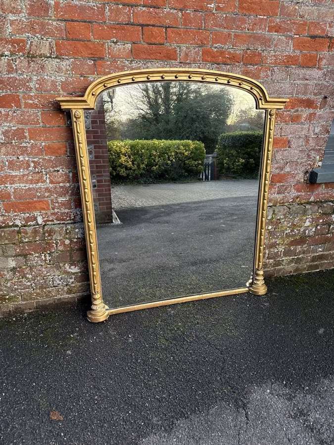 A Stunning large Antique English 19th C gilt Overmantle Mirror.