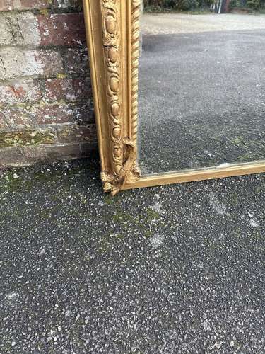 A Spectacular large Antique English 19th C arched top gilt Mirror.