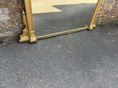 A Delightful large Antique English 19th C gilt Overmantle Mirror.