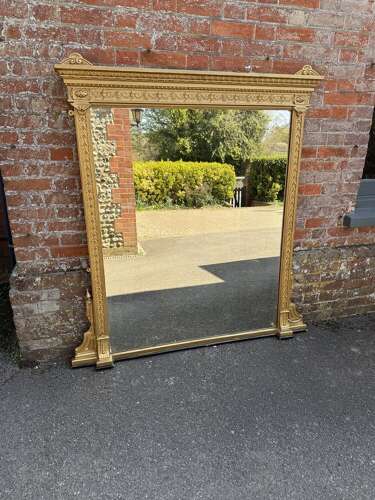 A Delightful large Antique English 19th C gilt Overmantle Mirror.