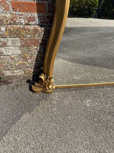 A Spectacular large Antique English 19th C shaped gilt Overmantle Mirror.