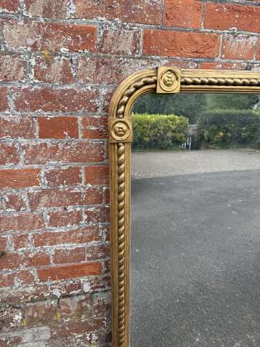 A Stunning large Antique English 19th C arched top rope twist gilt Overmantle Mirror.