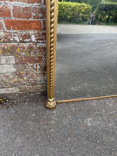 A Stunning large Antique English 19th C arched top rope twist gilt Overmantle Mirror.