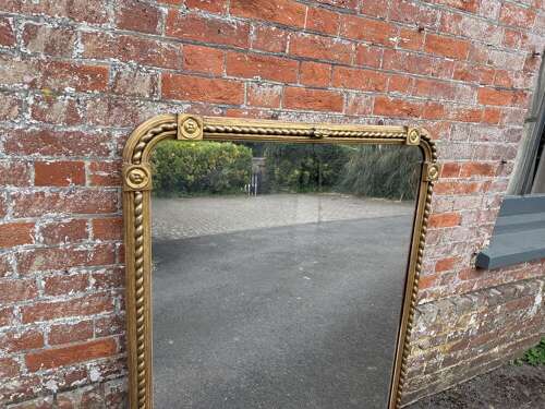 A Stunning large Antique English 19th C arched top rope twist gilt Overmantle Mirror.