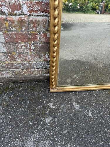 A Fabulous large Antique English 19th C shaped top beaded framed gilt Overmantlel Mirror.