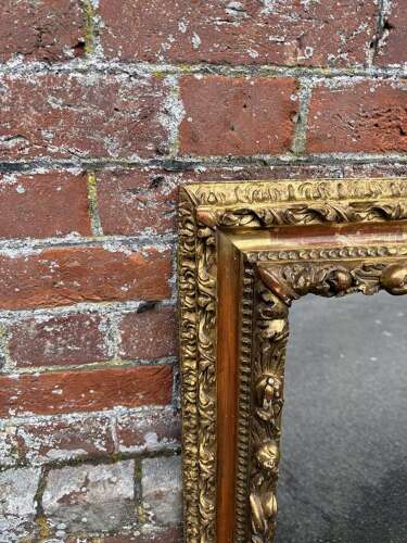 A Spectacular Italian Early 20th C carved wood & gesso gilt ornate Mirror.