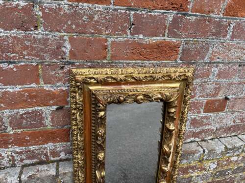 A Spectacular Italian Early 20th C carved wood & gesso gilt ornate Mirror.