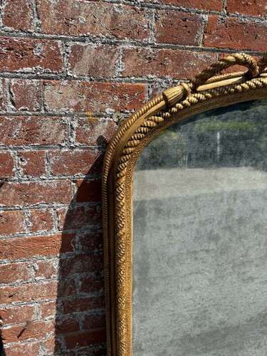 An Exceptional large Antique English 19th C arched top gilt rope twist Overmantle Mirror.