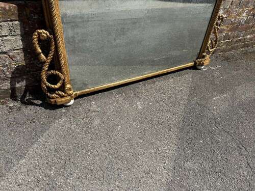 An Exceptional large Antique English 19th C arched top gilt rope twist Overmantle Mirror.