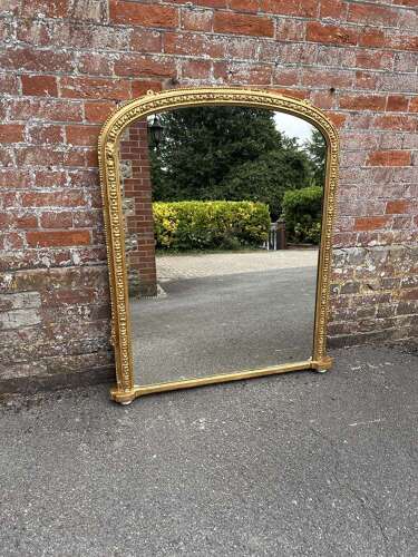 A Wonderful large Antique English 19th C gilt arched top Overmantle Mirror.