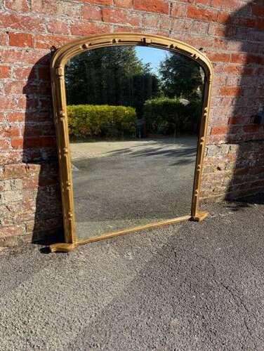 A Delightful large Antique Large English 19th C arched top gilt Overmantle Mirror.