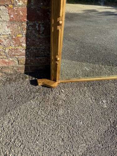 A Delightful large Antique Large English 19th C arched top gilt Overmantle Mirror.