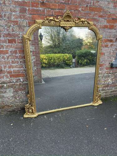 An Exceptional large Antique English 19th C shape top gilt Overmantle Mirror.