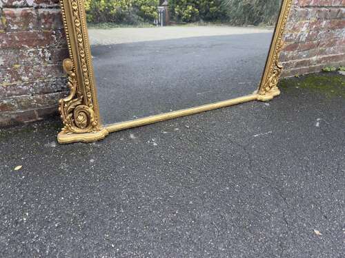An Exceptional large Antique English 19th C shape top gilt Overmantle Mirror.