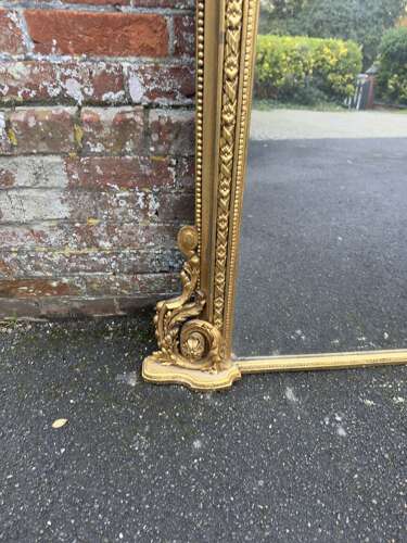 An Exceptional large Antique English 19th C shape top gilt Overmantle Mirror.