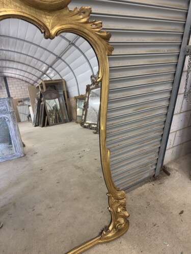 AN Exceptional large Antique English 19th Century gilt shaped Mirror.
