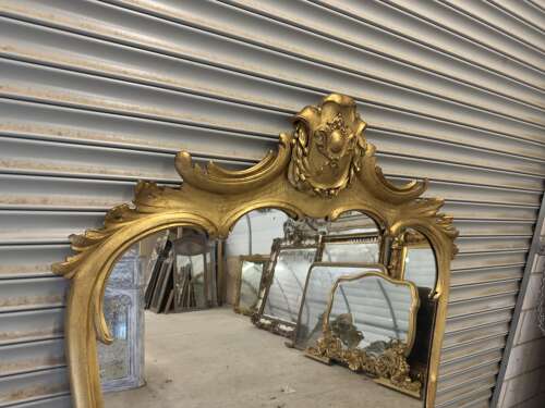 AN Exceptional large Antique English 19th Century gilt shaped Mirror.