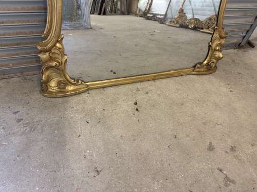 AN Exceptional large Antique English 19th Century gilt shaped Mirror.