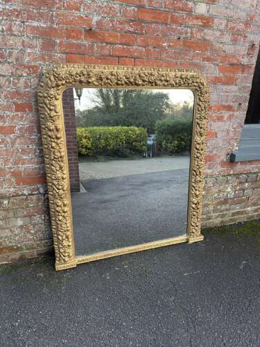 A Superb large Antique English 19th C arched top gilt ornate framed Overmantle Mirror.