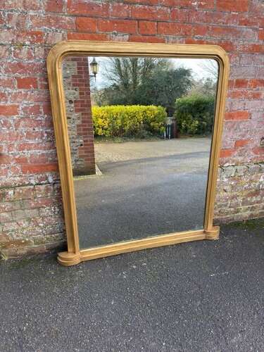 A Fabulous large Antique English 19th C arched top gilt Overmantle Mirror.