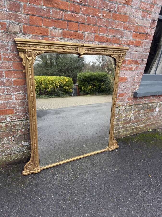 A Delightful large Antique English 19th C gilt Overmantle Mirror.