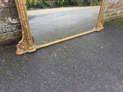 A Delightful large Antique English 19th C gilt Overmantle Mirror.