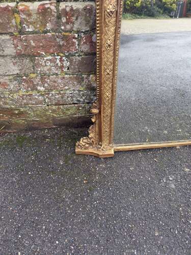 A Delightful large Antique English 19th C gilt Overmantle Mirror.