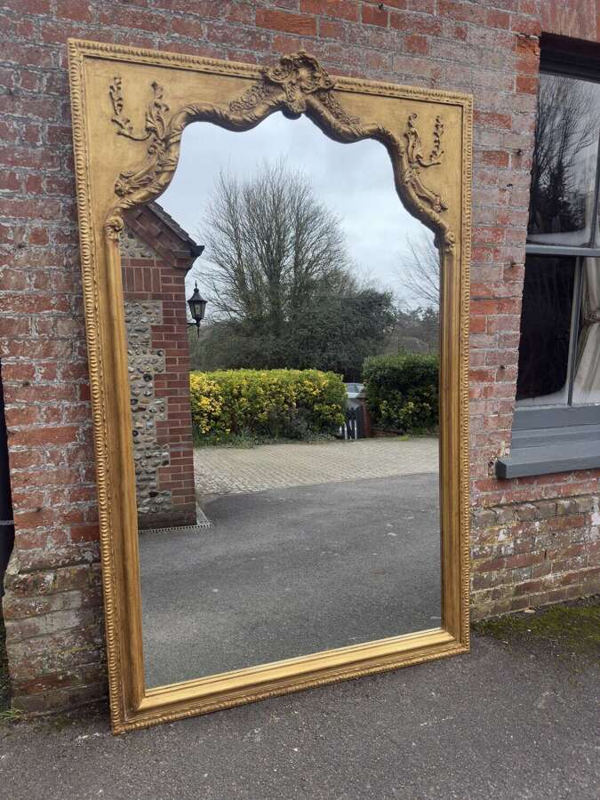 An Exceptional large Antique English 19th C shape top framed gilt Mirror.