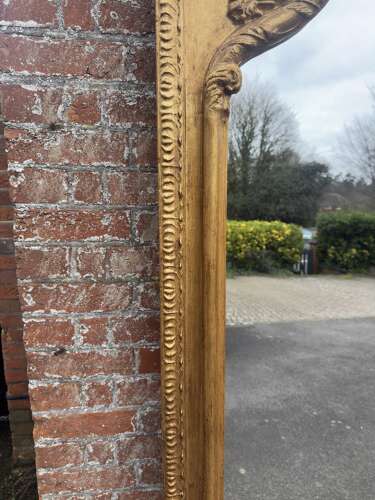 An Exceptional large Antique English 19th C shape top framed gilt Mirror.