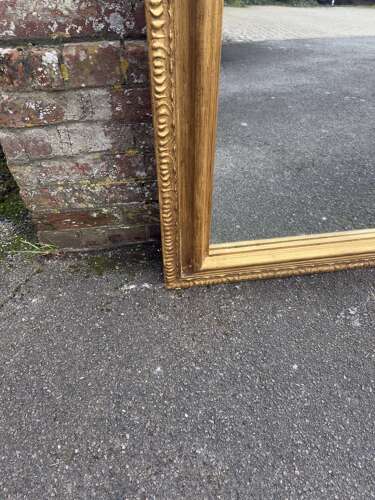 An Exceptional large Antique English 19th C shape top framed gilt Mirror.