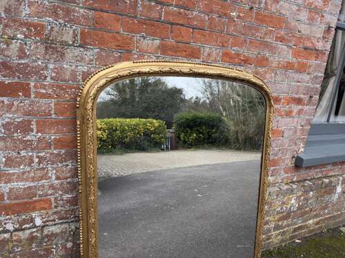 A Fabulous large Antique English 19th C arched top gilt Overmantle Mirror.