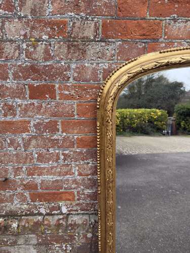 A Fabulous large Antique English 19th C arched top gilt Overmantle Mirror.