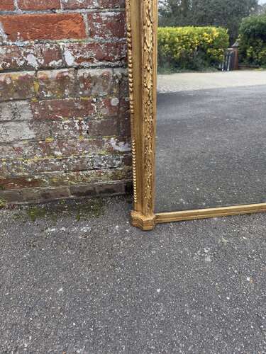 A Fabulous large Antique English 19th C arched top gilt Overmantle Mirror.
