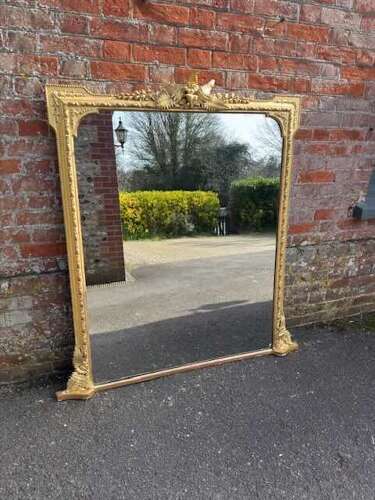 A Spectacular large Antique English 19th Century gilt Overmantle Mirror.