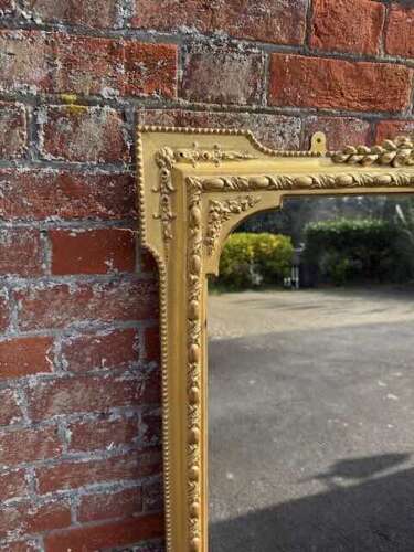 A Spectacular large Antique English 19th Century gilt Overmantle Mirror.