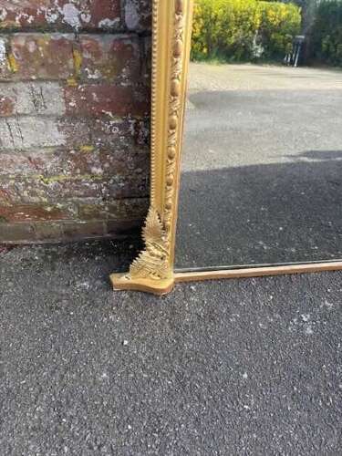 A Spectacular large Antique English 19th Century gilt Overmantle Mirror.