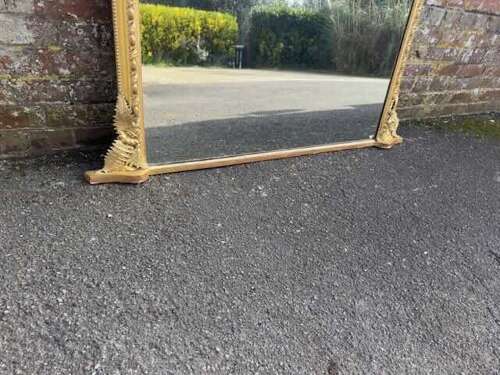 A Spectacular large Antique English 19th Century gilt Overmantle Mirror.