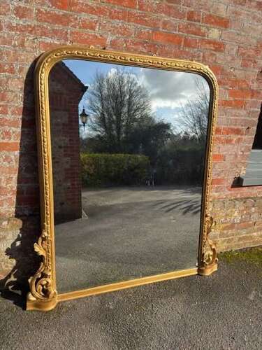A Stunning large Antique English 19th C arched top gilt Overmantle Mirror.