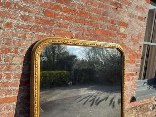 A Stunning large Antique English 19th C arched top gilt Overmantle Mirror.