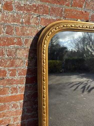 A Stunning large Antique English 19th C arched top gilt Overmantle Mirror.
