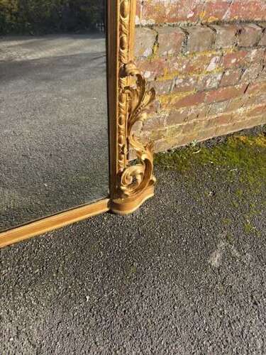 A Stunning large Antique English 19th C arched top gilt Overmantle Mirror.