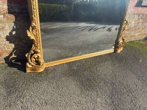 A Stunning large Antique English 19th C arched top gilt Overmantle Mirror.