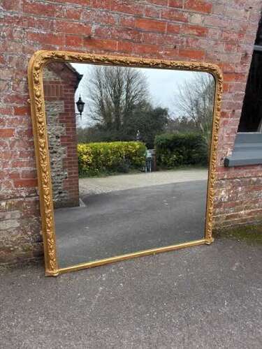 A Superb large Antique English 19th Century gilt tulip framed Overmantel Mirror
