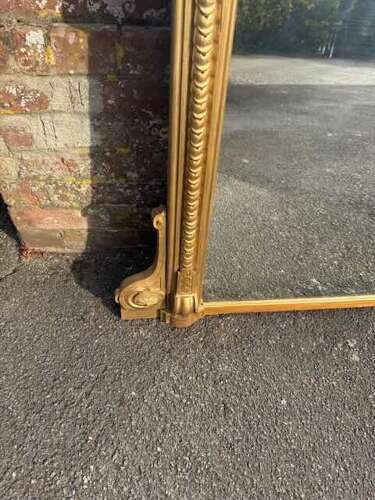 An Exceptional large Antique English 19th Century gilt ribbed Overmantle Mirror.