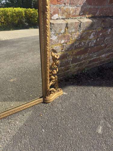 A Highly Impressive Large Antique English 19th Century gilt Overmantle Mirror.