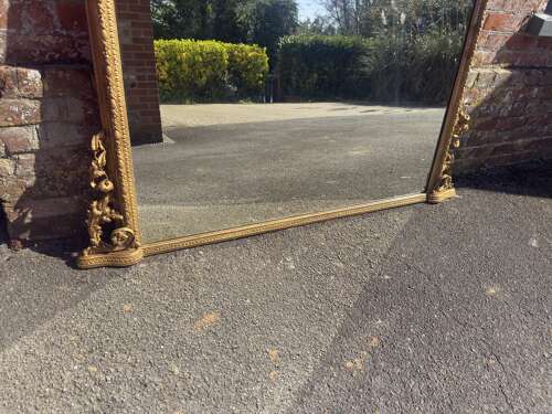 A Highly Impressive Large Antique English 19th Century gilt Overmantle Mirror.