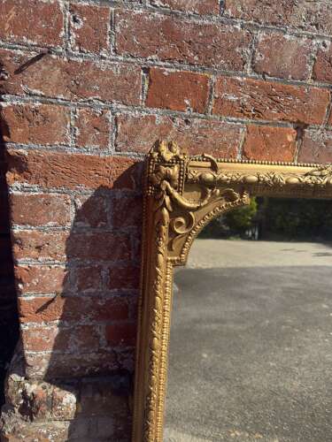 A Highly Impressive Large Antique English 19th Century gilt Overmantle Mirror.
